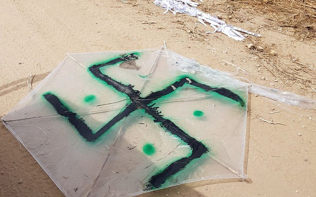 Palestinians fly swastika kite with petrol bomb across Gaza border into Israel