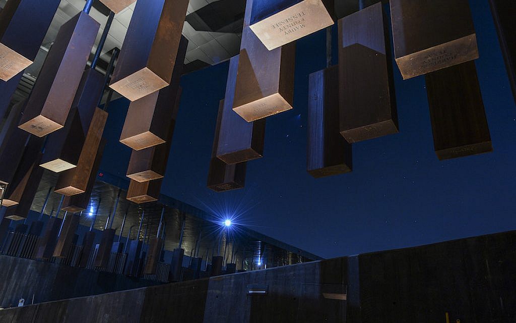 The names of lynching victims are inscribed on weathering steel columns that hang from the ceiling at The National Memorial for Peace and Justice in Montgomery, Alabama, seen on April 20, 2018. (Ricky Carioti/The Washington Post via Getty Images/via JTA)