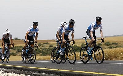 Members of the Israel Cycling Academy team train near Kibbutz Beit Guvrin on May 1, 2018, a few days before the start of the Giro d'Italia cycling race. (AFP Photo/Menahem Kahana)