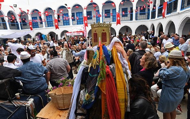 Jews gather at the Ghriba synagogue in Tunisia's Mediterranean resort island of Djerba on the first day of the annual Jewish pilgrimage to the synagogue on May 2, 2018. (AFP Photo/Fethi Belaid)