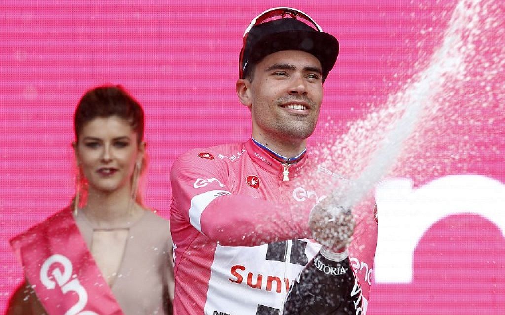 Riding in Jerusalem, defending champion captures lead in day 1 of Giro ...
