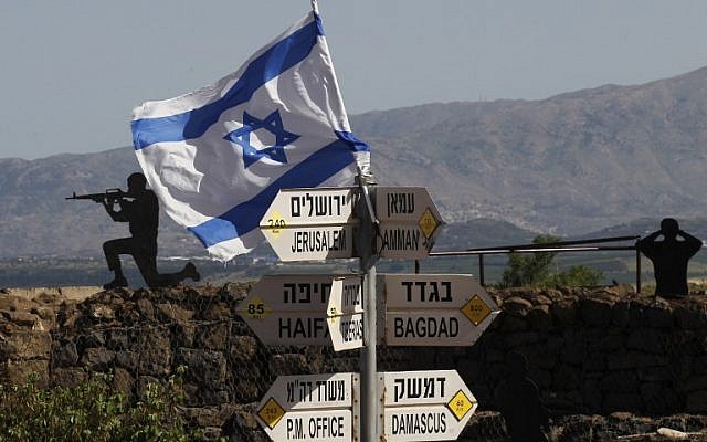 An Israeli flag is seen placed on Mount Bental in the  Golan Heights on May 10, 2018.( AFP PHOTO / JALAA MAREY)
