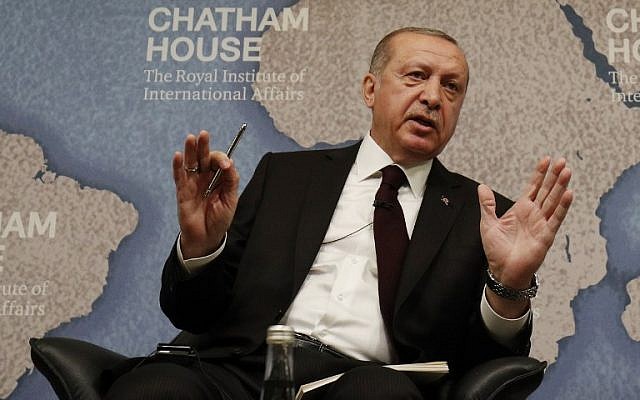 Turkey's President Recep Tayyip Erdogan answers questions after giving a speech at Chatham house in London on May 14, 2018. (AFP Photo/Adrian Dennis)