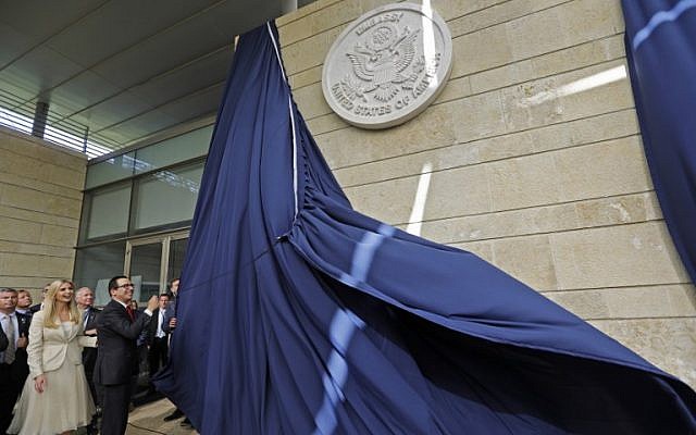 US Treasury Secretary Steve Mnuchin and US President Donald Trump's daughter and adviser Ivanka Trump unveil the inauguration plaque during the opening of the US embassy in Jerusalem on May 14, 2018. (AFP Photo/Menahem Kahana)
