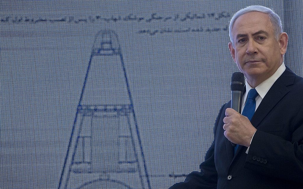 Prime Minister Benjamin Netanyahu presents material on Iranian nuclear weapons development during a press conference in Tel Aviv, April 30 2018. (AP Photo/Sebastian Scheiner)