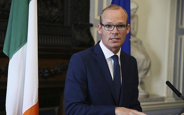 Ireland's Foreign Affairs Minister, Simon Coveney, speaks to the media, at Iveagh House in Dublin, August 16, 2017. (Brian Lawless/PA via AP)