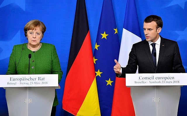 In this March 23, 2018, file photo, French President Emmanuel Macron, right, and German Chancellor Angela Merkel speak at a news conference in Brussels (AP Photo/Geert Vanden Wijngaert, File)