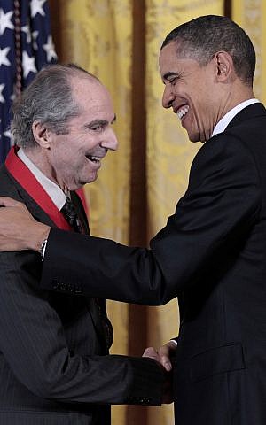 In this March 2, 2011, file photo, President Barack Obama, right, presents a National Humanities Medal to novelist Philip Roth during a ceremony in the East Room of the White House in Washington. Roth, prize-winning novelist and fearless narrator of sex, religion and mortality, has died at age 85, his literary agent said Tuesday, May 22, 2018. (AP Photo/Pablo Martinez Monsivais)