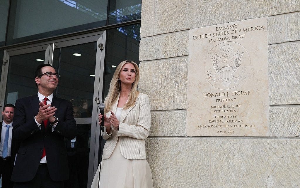US Secretary of the Treasury Steven Munchin, left, and daughter of US President Donald Trump, Senior Adviser Ivanka Trump, unveil a dedication plaque during the official opening ceremony of the US embassy in Jerusalem on May 14, 2018. (Yonatan Sindel/Flash90)