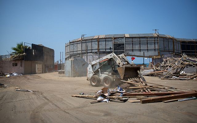 Demolition begins on the abandoned Dolphinarium building in Tel Aviv on May 15, 2018. (Miriam Alster/Flash90)