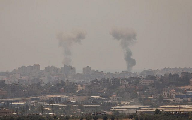 Smoke rises following Israeli strikes in the Gaza Strip, as seen from the Israeli side of the border on May 29, 2018 (Yonatan Sindel/Flash90)