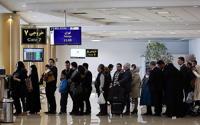 Illustrative photo of people waiting in a line at Mashhad International Airport in Iran. (CC BY 4.0, Nima Najafzadeh, Wikimedia Commons)