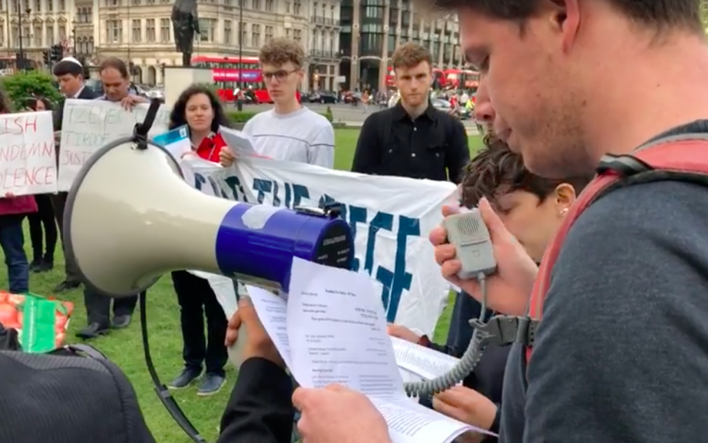 A group of Jews gather in Parliament Square, London, to recite kaddish for 62 Palestinians killed in Gaza, on May 16, 2018. (Screen capture: Facebook)
