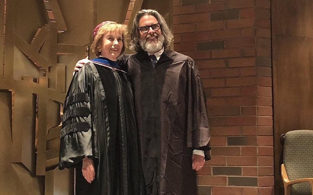 Novelist Michael Chabon, shown with his sponsor, Tamara Cohn Eskenazi, received an honorary doctorate and gave an address at the Hebrew Union College-Jewish Institute of Religion commencement ceremonies in Los Angeles, May 14, 2018. (Hebrew Union College/Twitter)