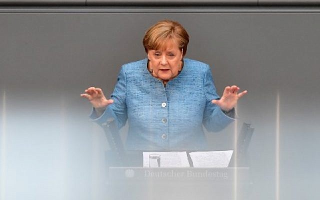 German Chancellor Angela Merkel gives a speech on her government's budget policy at the Bundestag (lower house of parliament) in Berlin, May 16, 2018. (AFP PHOTO / Tobias SCHWARZ)