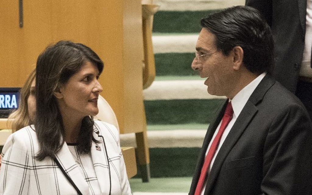 US Ambassador to the United Nations Nikki Haley talks with Israel's Ambassador to the UN Danny Danon before a vote in the General Assembly June 13, 2018 in New York. (AFP PHOTO / Don EMMERT)