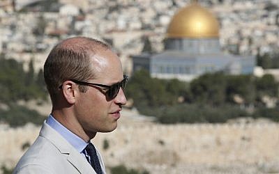 Britain's Prince William stands on Jerusalem's Mount of Olives overlooking the Old City with the golden dome of the Dome of the Rock on June 28, 2018. (AFP Photo/Pool/Thomas Coex)