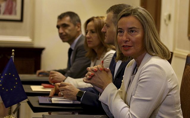 EU High Representative for Foreign Affairs and Security Policy Federica Mogherini, right, attends a meeting with Jordanian Foreign Minister Ayman Safadi in Amman, Jordan, June 10, 2018. (AP Photo/Raad al-Adayleh)