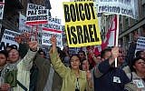 A crowd protests against Israel during a demonstration by an estimated 10,000 people in Madrid, Spain, Monday April 15, 2002 (AP/Denis Doyle)