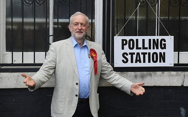Illustrative: Britain's opposition Labour Party leader Jeremy Corbyn poses for photographers as he arrives to cast his vote for local council elections at a polling station in Holloway, London, May 3, 2018. (Victoria Jones/PA via AP)