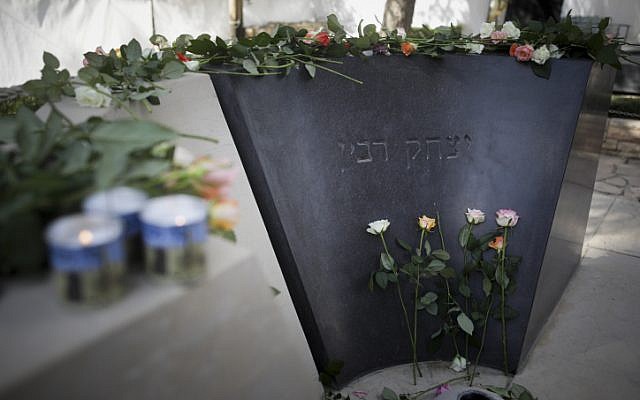 Flowers lay on the grave of late prime minister Yitzhak Rabin during a memorial service marking 21 years since his assassination, held at Mount Herzl cemetery in Jerusalem on November 4, 2016. (Yonatan Sindel/Flash90)
