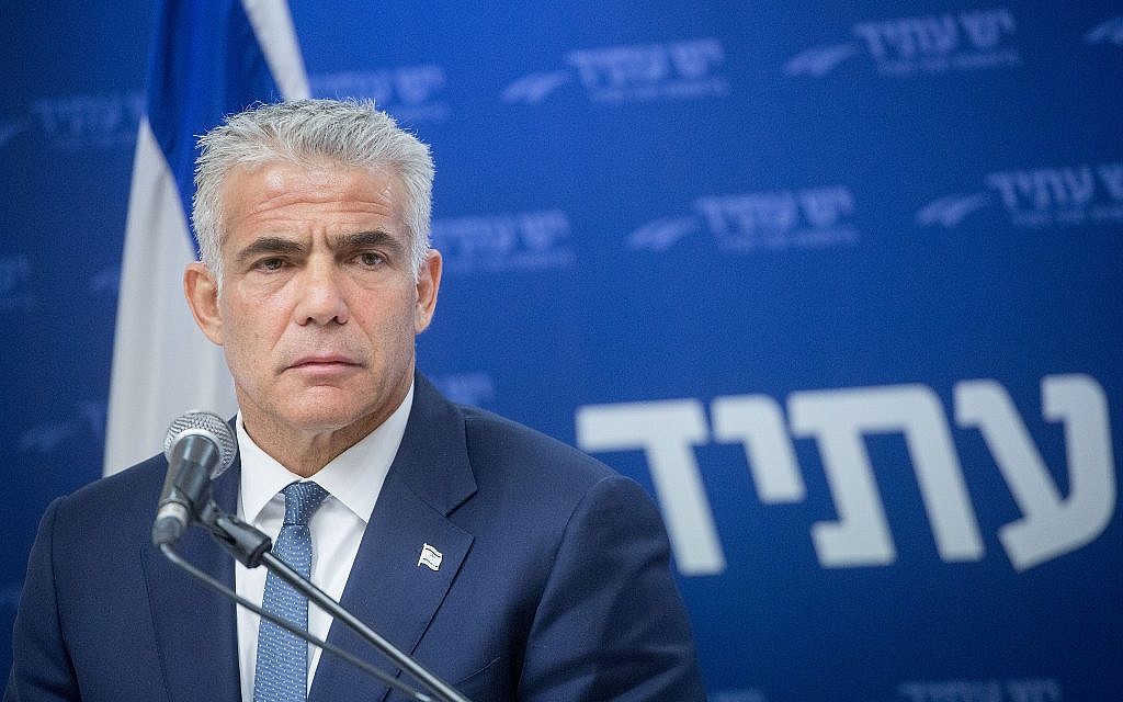 Yesh Atid chairman Yair Lapid leads his weekly faction meeting in the Knesset, June 4, 2018. (Miriam Alster/Flash90)