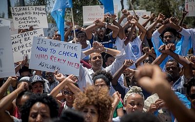 Illustrative: Asylum seekers from Eritrea protest against the Eritrean ambassador to Israel, outside the Foreign ministry in Jerusalem on June 25, 2018. (Yonatan Sindel/Flash90)