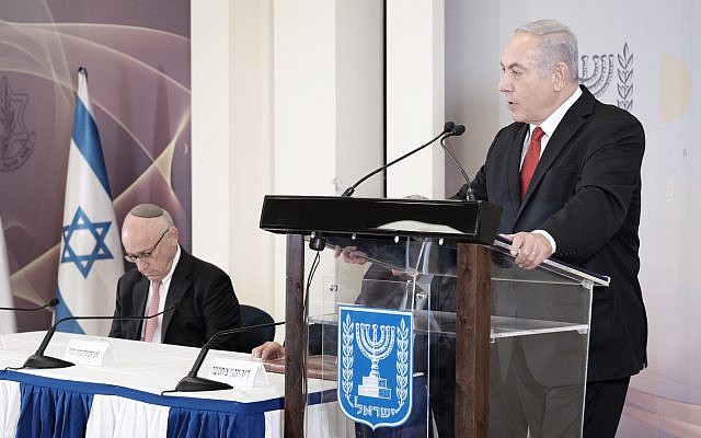 Prime Minister Benjamin Netanyahu at a press conference at the Defense Ministry in Tel Aviv on June 27, 2018, to discuss Poland's amended Holocaust Law. (Tomer Neuberg/Flash90)