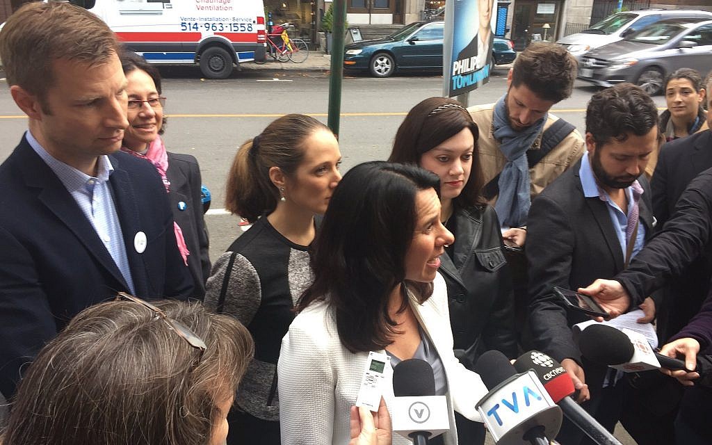 Mindy Pollak, center right, behind Montreal Mayor Valerie Plante at a press conference during the political campaign. (Courtesy)