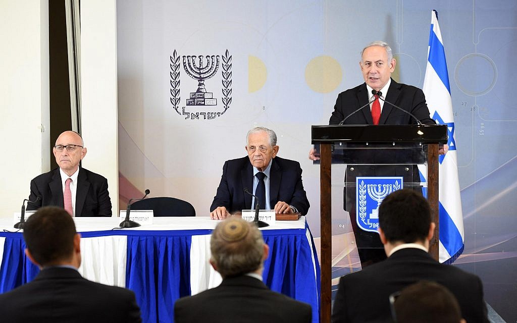 Benjamin Netanyahu, left, delivering a statement in Tel Aviv on June 27, 2018 regarding Poland's amended Holocaust law. (Haim Zach/PMO)