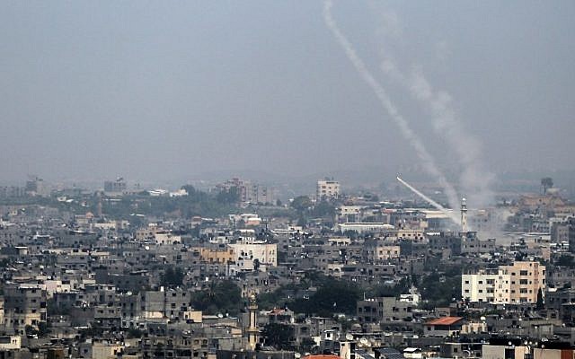 A picture taken on July 14, 2018 shows Palestinian rockets being fired from Gaza City towards Israel ( AFP PHOTO / BASHAR TALEB)