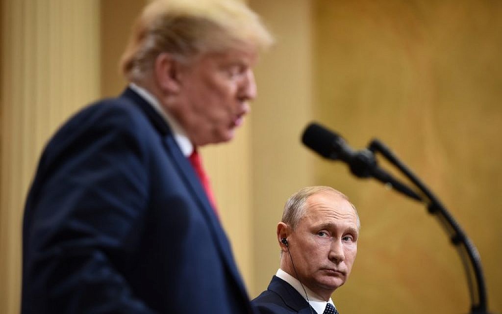 US President Donald Trump (L) and Russia's President Vladimir Putin attend a joint press conference after a meeting at the Presidential Palace in Helsinki, on July 16, 2018. (AFP PHOTO / Brendan SMIALOWSKI)