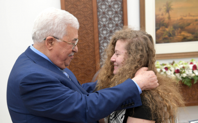 Palestinian Authority President Mahmoud Abbas and Ahed Tamimi in Ramallah on July 29. 2018. (WAFA)