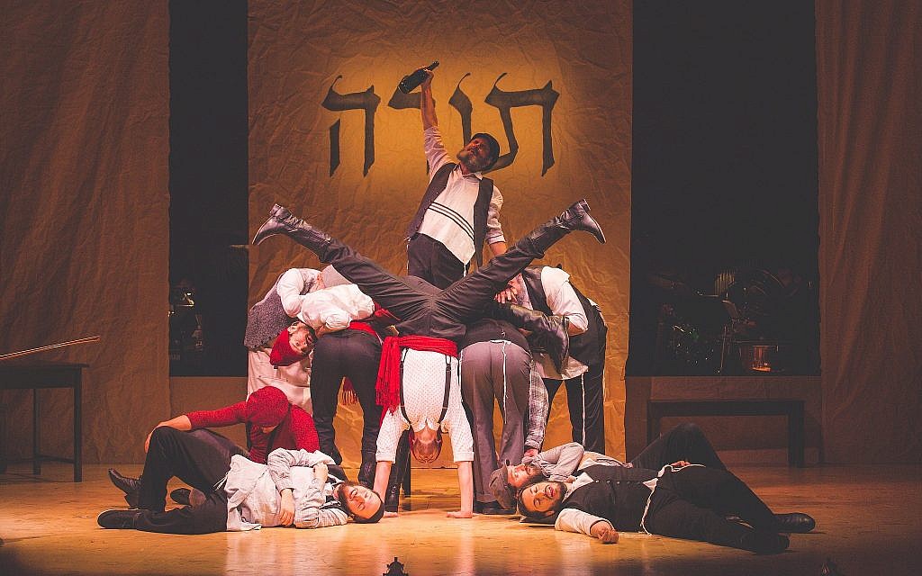 Steven Skybell and Male Ensemble sing 'To Life' in the National Yiddish Theatre Folksbiene's production of 'Fiddler on the Roof.' (Victor Nechay/ ProperPix.com)