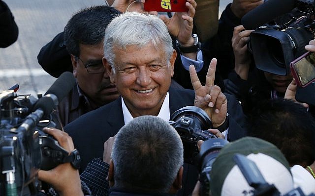 Presidential candidate Andres Manuel Lopez Obrador, of the MORENA party, arrives at a polling station to vote during general elections in Mexico City, on July 1, 2018. (AP Photo/ Marco Ugarte)