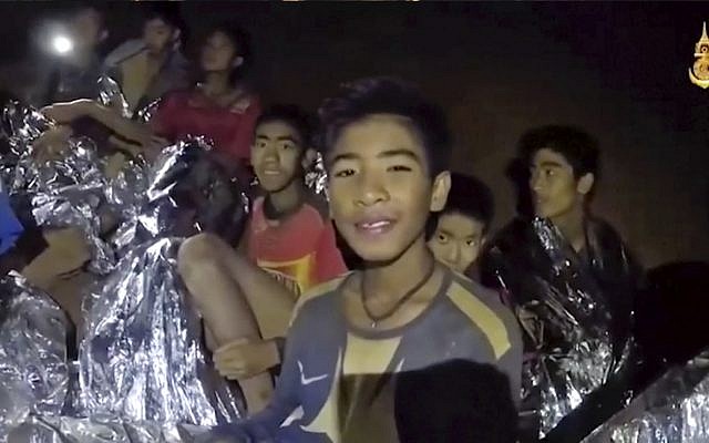 Image taken from video shows Thai children trapped inside a cave in Mae Sai, northern Thailand. (Royal Thai Navy Facebook Page via AP)