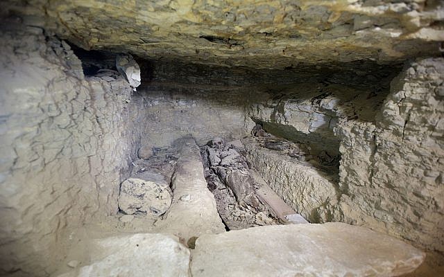 Recently discovered mummies are seen at a mummification workshop dating back some 2,500 years at an ancient necropolis near Egypt's famed pyramids in Saqqara, Giza, Saturday, July 14, 2018. (AP/Amr Nabil)
