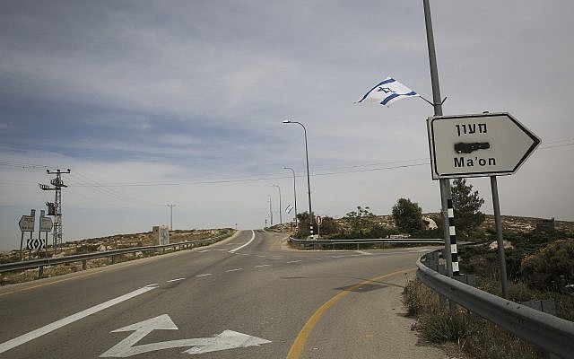 A road sign with Arabic blotted out, in the West Bank, on April 23, 2014. (Hadas Parush/Flash 90.)