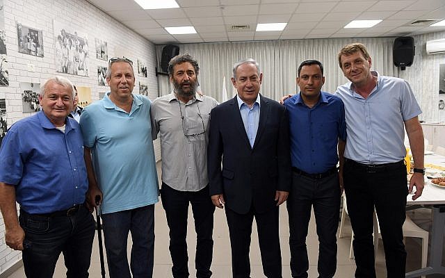 Prime Minister Benjamin Netanyahu, 3rd from right, meets with heads of local authorities from the Gaza Strip border communities during a visit to Sderot on July 16, 2018. (Haim Zach/GPO)
