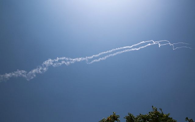 Smoke trails from two Israeli Patriot interceptor missiles that Israel says shot down a Syrian fighter jet are seen in northern Israel on July 24, 2018. (David Cohen/Flash90)