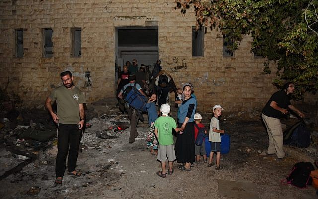 Settlers visit the evacuated settlement of Sa-Nur on July 24, 2018. (Homesh T'cheela)