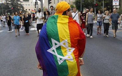 Illustrative: Participants take part in the annual Jerusalem Gay Pride parade, on August 2, 2018. (AFP Photo/Menahem Kahana)