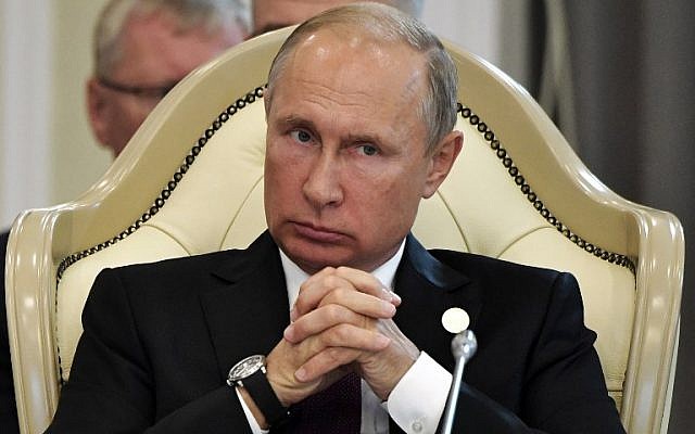 Russian President Vladimir Putin attends the plenary session at the 5th Caspian Summit in Aktau on August 12, 2018. (AFP PHOTO / Sputnik / Alexey NIKOLSKY)