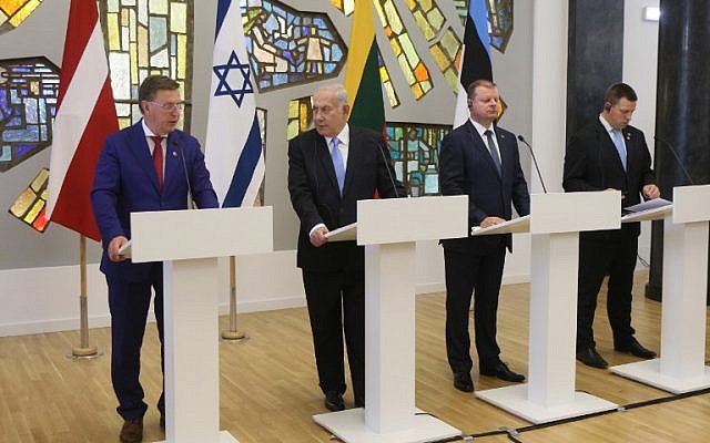 From left: Latvia's Prime Minister Maris Kucinskis, Israel's Prime Minister Benjamin Netanyahu, Lithuania's Prime Minister Saulius Skvernelis and Estonia's Prime Minister Juri Ratas, hold a joint press conference following a meeting in Vilnus on August 24, 2018. (AFP PHOTO / Petras Malukas)
