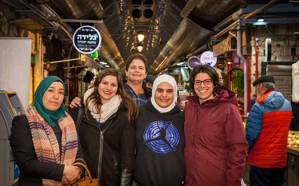 Participants of the Teachers' Lounge coexistence project at the Mahane Yehuda Market in Jerusalem. (Courtesy: Eyal Tagar)