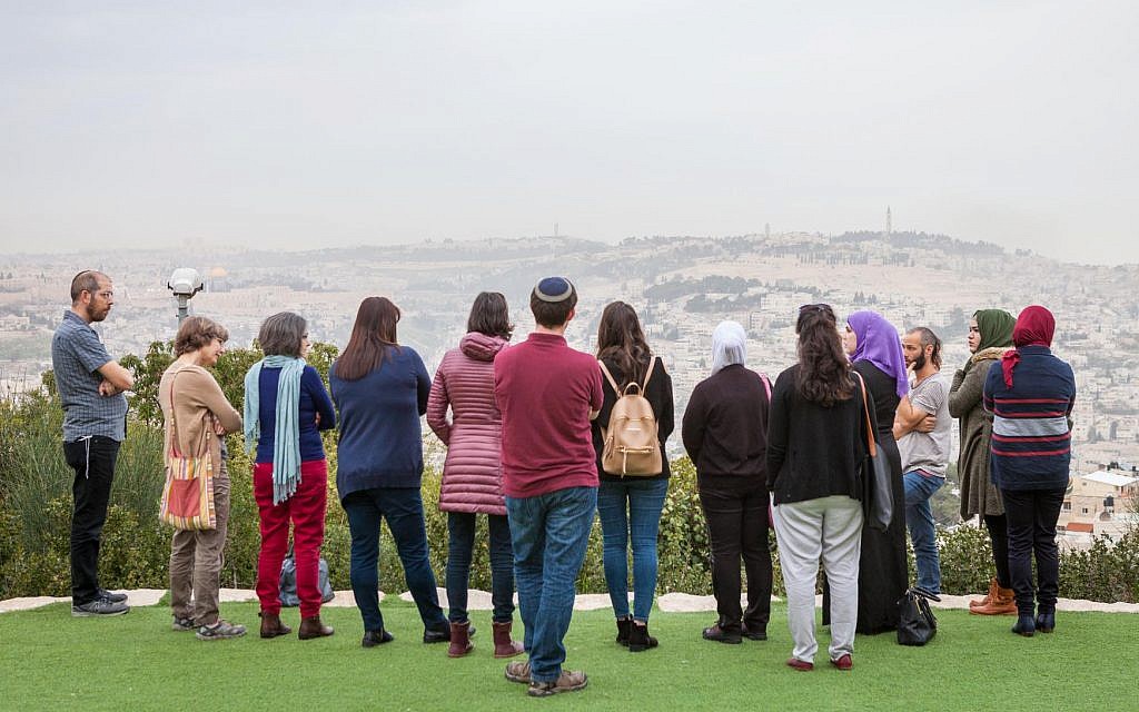 Participants of the Teachers' Lounge coexistence project at a promenade overlooking Jerusalem. (Courtesy: Eyal Tagar)