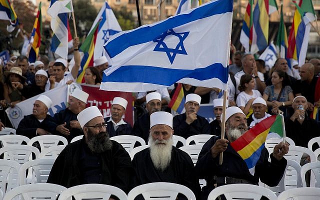 Israelis from the Druze community participate in a rally against Israel's nation-state law, in Tel Aviv, Saturday, August 4, 2018. (AP Photo/Sebastian Scheiner)