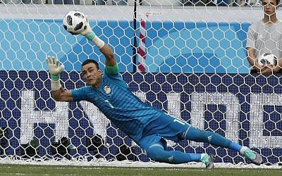 In this file photo dated June 25, 2018, Egypt goalkeeper Essam El Hadary deflects a penalty during the group A match between Saudi Arabia and Egypt at the 2018 soccer World Cup at the Volgograd Arena in Volgograd, Russia. (AP Photo/Darko Vojinovic)