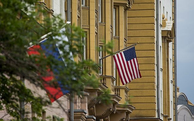 US and Russian flags hang at the U.S. Embassy in Moscow, Russia, Friday, July 28, 2017. (AP Photo/Alexander Zemlianichenko) US and Russian flags hang at the U.S. Embassy in Moscow, Russia, Friday, July 28, 2017. (AP Photo/Alexander Zemlianichenko)