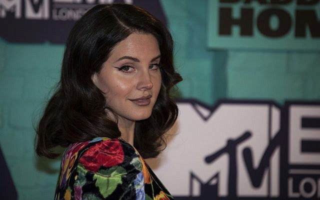 Musician Lana Del Rey poses for photographers upon arrival at the MTV European Music Awards 2017 in London, Sunday, Nov. 12th, 2017. (Photo by Vianney Le Caer/Invision/AP)